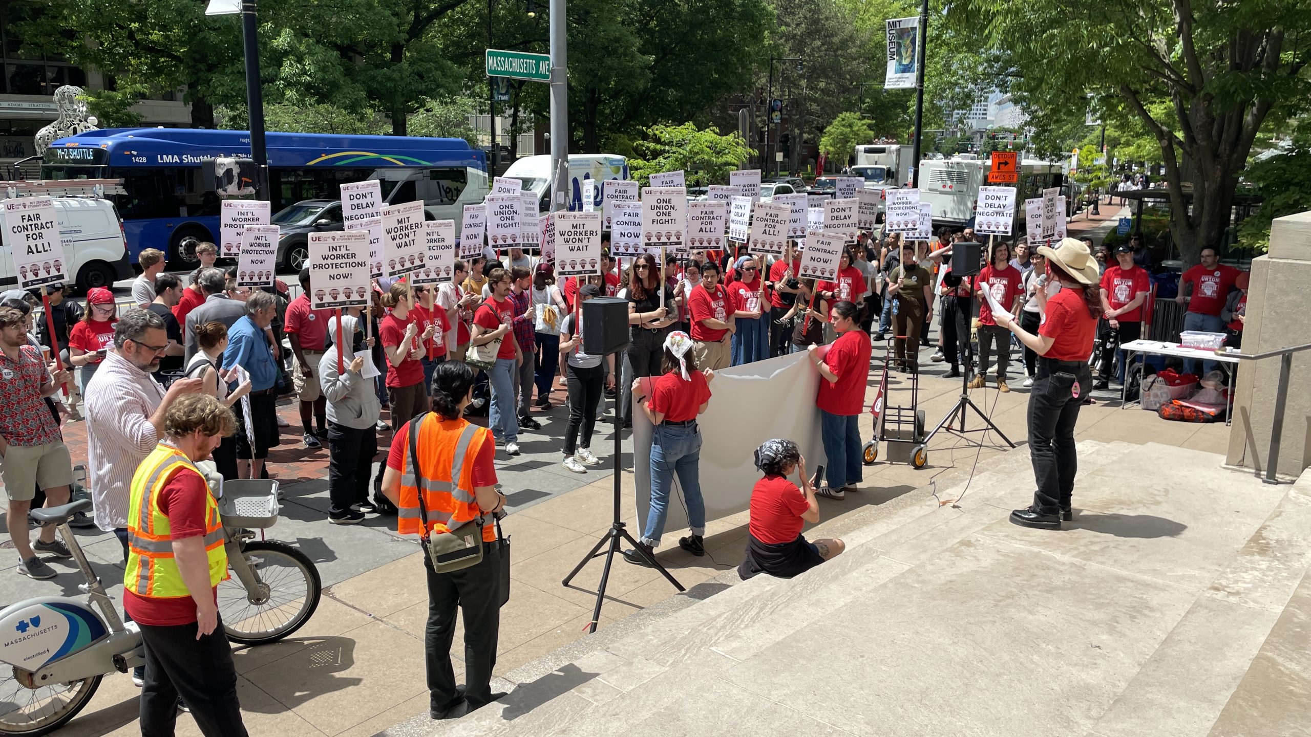 MIT grad students rally on commencement day, Harvard students picket